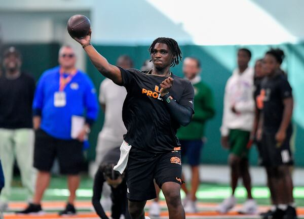 Miami quarterback Cam Ward throws the ball during the school's NFL football pro day Monday March 24, 2025. (AP Photo/Michael Laughlin)