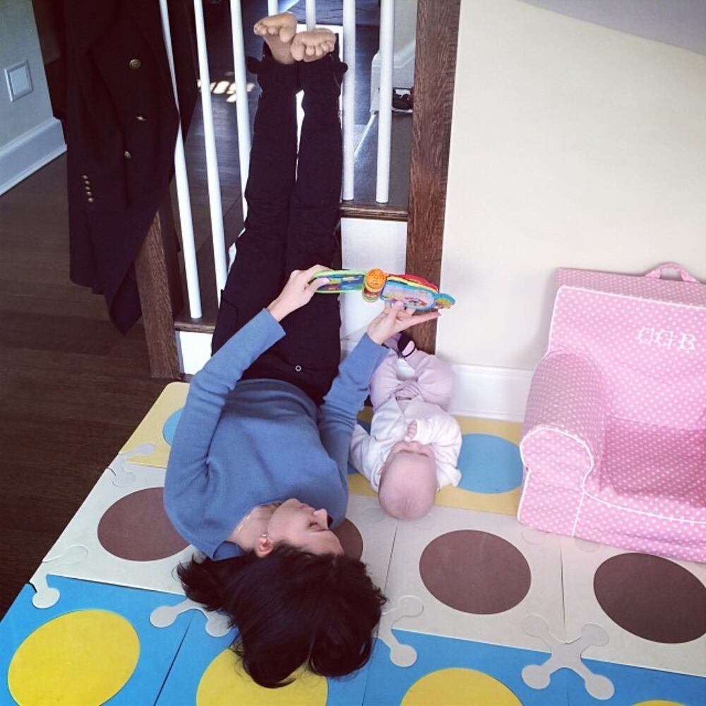 March 1, 2014: Mommy isn't feeling well so we are doing viparita karani & reading stories #hilariaypd #yogapostureoftheday (try this pose if you are under the weather)