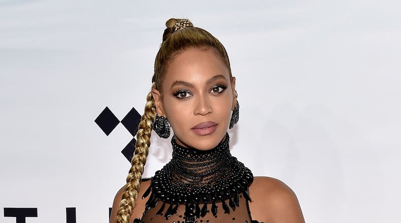 FILE - In this Oct. 15, 2016, file photo, singer Beyonce Knowles attends the Tidal X: 1015 benefit concert in New York. Beyonce brought her star power to a pre-wedding party for the daughter of India’s richest mogul. Beyonce performed Sunday, Dec. 9, 2018, and sang some of her hits such as “Crazy In Love” and “Perfect.” Guests included Hillary Clinton and a host of Bollywood stars in the historic Indian city of Udaipur. (Photo by Evan Agostini/Invision/AP, File) ORG XMIT: NYAG102