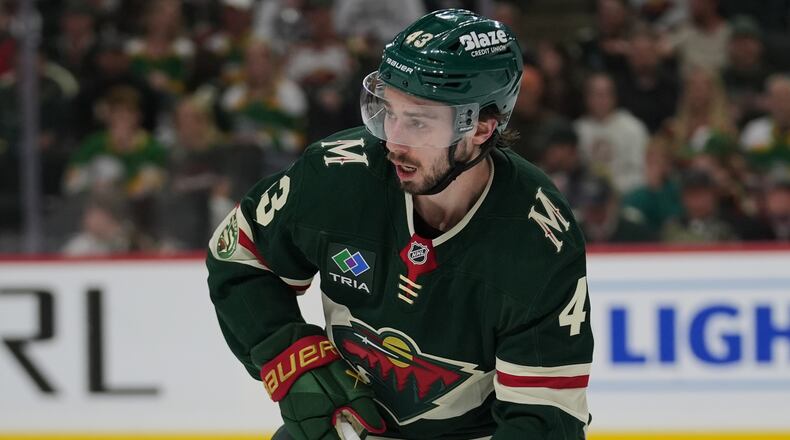 FILE - Minnesota Wild defenseman Quinn Hughes (43) skates with the puck during the second period of Game 3 of an NHL Stanley Cup hockey second-round playoff series against the Colorado Avalanche Saturday, May 9, 2026, in St. Paul, Minn. (AP Photo/Abbie Parr, File)