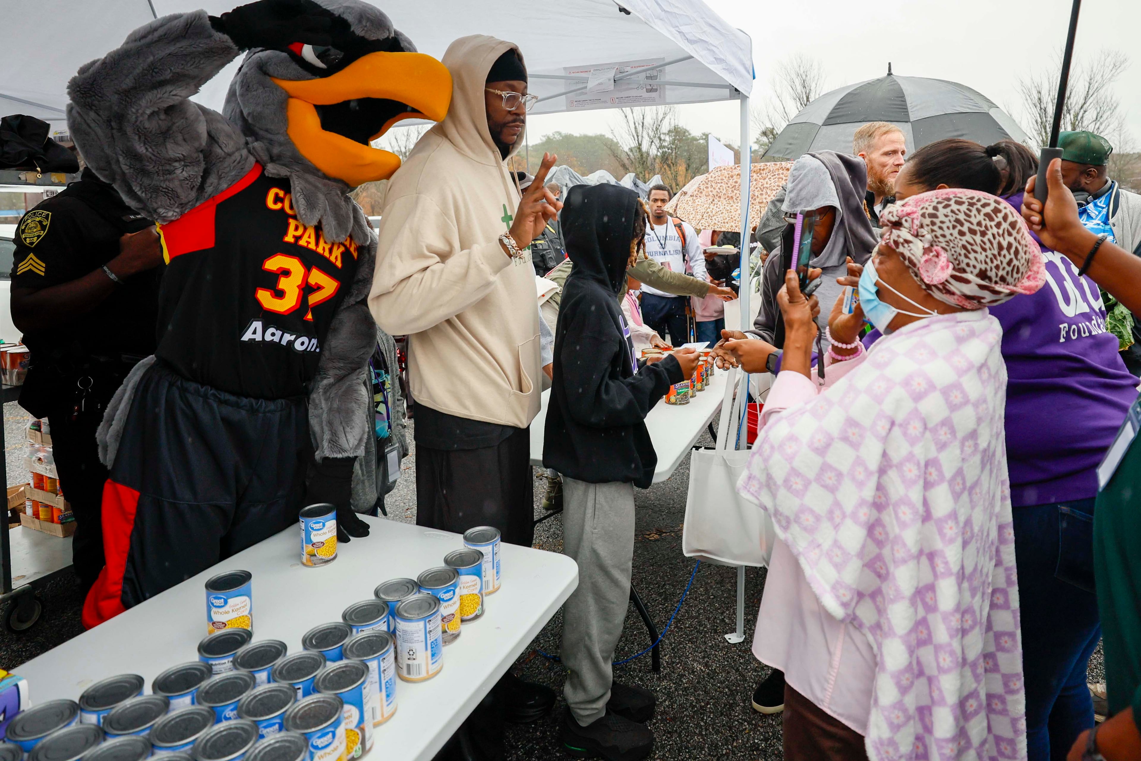 Tauheed Epps, professionally known as 2 Chainz, poses for a photo at the “Greens and Things" Thanksgiving giveaway event on Tuesday, Nov. 24, 2025. (Miguel Martinez/ AJC)