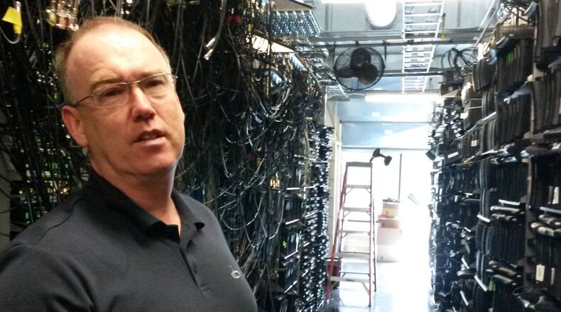 Chief Technology Officer Charles Cheevers at the headquarters of Arris Group, where more than 30,000 cable modems are used for testing. Arris is North America's biggest maker of set-top and gateway cable boxes.