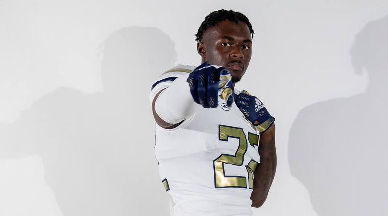Georgia Tech wide receiver Leo Blackburn models the new Adidas uniform that the Yellow Jackets will wear in the 2022 season. (Georgia Tech Football)