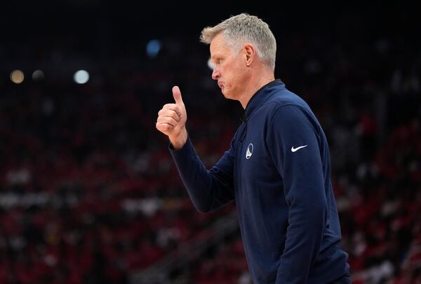 Golden State Warriors head coach Steve Kerr instructs on the sideline during the first half of Game 2 of an NBA basketball first-round playoff series against the Houston Rockets in Houston, Wednesday, April 23, 2025. (AP Photo/Karen Warren)