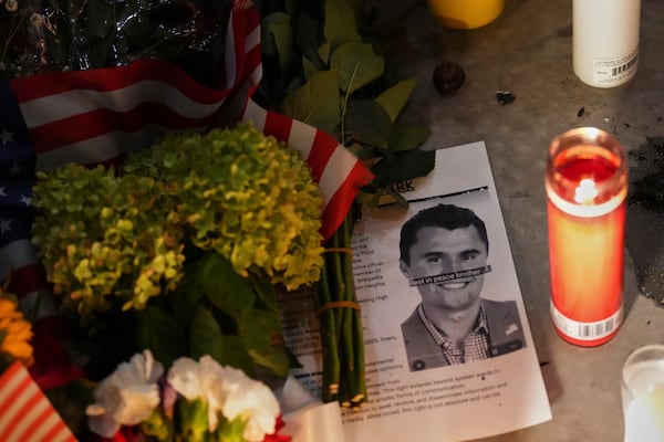 A vigil was held for political activist Charlie Kirk, the CEO and co-founder of Turning Point USA who was shot and killed Wednesday. (Lindsey Wasson/AP)