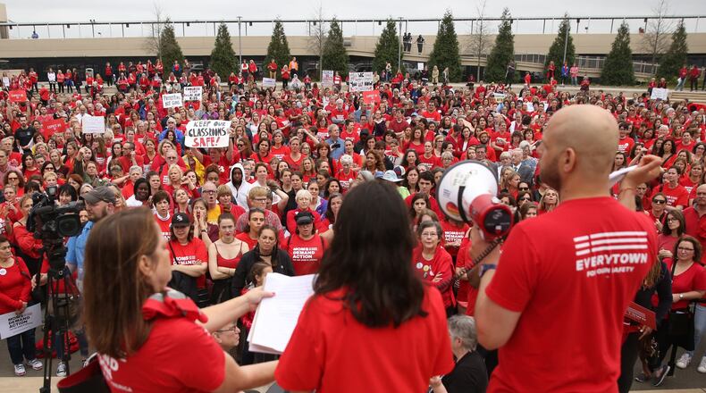 Without a power source for their PA system, speakers at the Moms Demand Action Advocacy Day rally last week at Liberty Plaza struggled until they acquired a bullhorn. PHOTO / JASON GETZ
