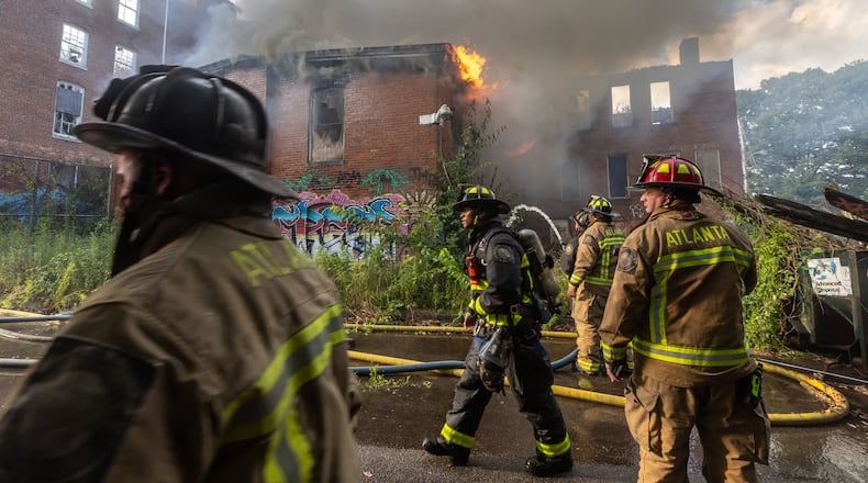Atlanta firefighters battled a blaze at Morris Brown College for the second time in 16 months at the historic building formerly known as Gaines Hall on June 13, 2024. (John Spink/AJC)
