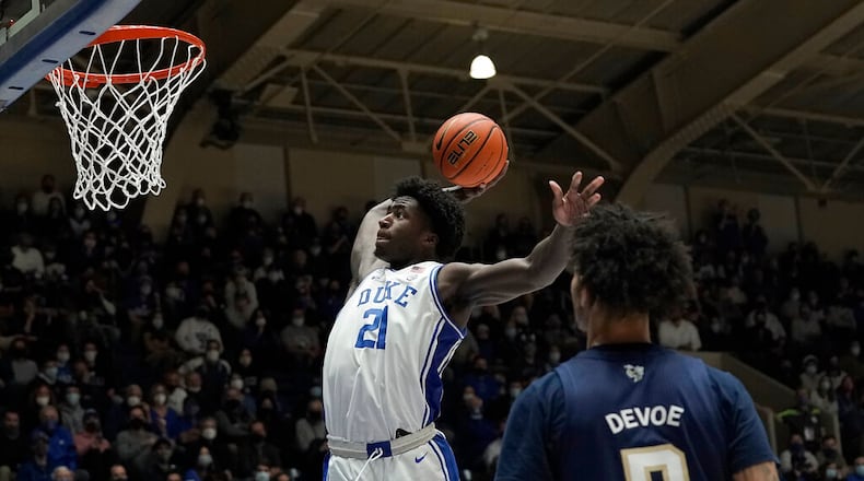 Duke forward A.J. Griffin (21) drives to the basket against Georgia Tech during the second half of an NCAA college basketball game in Durham, N.C., Tuesday, Jan. 4, 2022. (AP Photo/Gerry Broome)