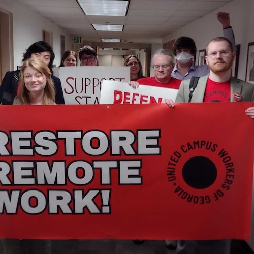 David Zackrone Hyde (far right) and other members of the United Campus Workers of Georgia conduct a walkout during a Georgia Board of Regents meeting in February. (Courtesy)