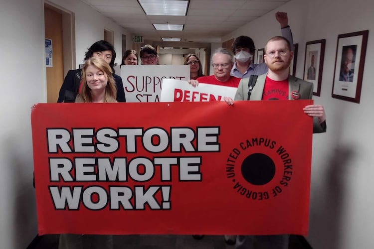 David Zackrone Hyde (far right) and other members of the United Campus Workers of Georgia conduct a walkout during a Georgia Board of Regents meeting in February. (Courtesy)