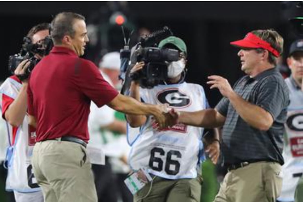 "I know it’ll be a big, big, big challenge for us," South Carolina coach Shane Beamer (left) says of facing Kirby Smart in November. (Curtis Compton/AJC 2022)