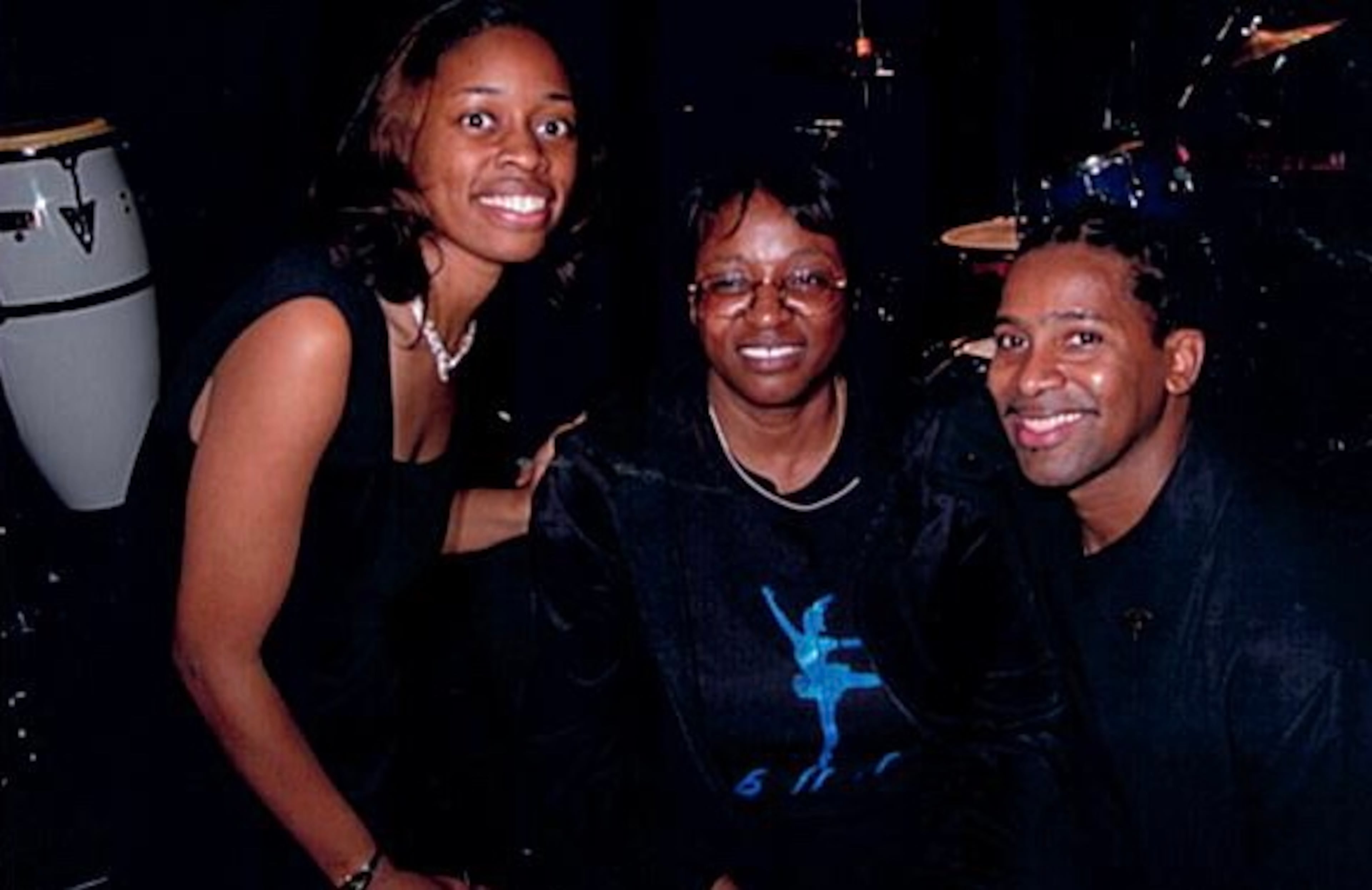 Chayla Harris Gaines (left), Joann Harris and "Urban Nutcracker" choreographer Waverly T. Lucas II backstage at one of Ballethnic Dance Company's performances. Harris was a backstage volunteer for many years, prepping and ironing costumes. (Photo courtesy of Chayla Harris Gaines)