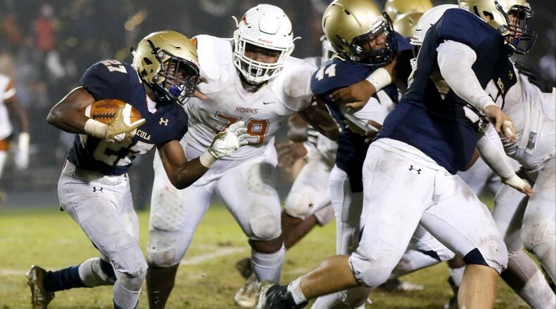 10-26-18 - Dacula, GA - Dacula running back Trenton Jones (27) runs the ball during the second half of a high school football game between Lanier and Dacula at Dacula High School in Dacula, Ga., on Friday, Oct. 26, 2018. (Casey Sykes for The Atlanta Journal-Constitution)
