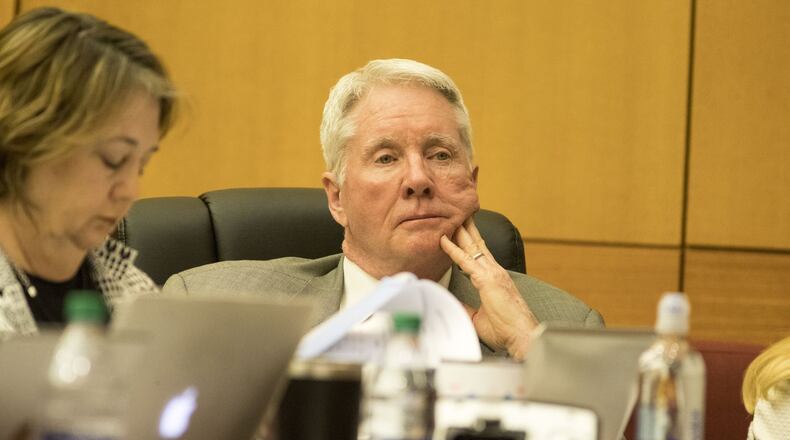 ATLANTA — Claud “Tex” McIver sits with his defense team while a potential juror is questioned on Thursday, March 8, 2018 — the fourth day of jury selection for the case before Fulton County Superior Court Chief Judge Robert McBurney. (Photo credit: Alyssa Pointer/alyssa.pointer@ajc.com)