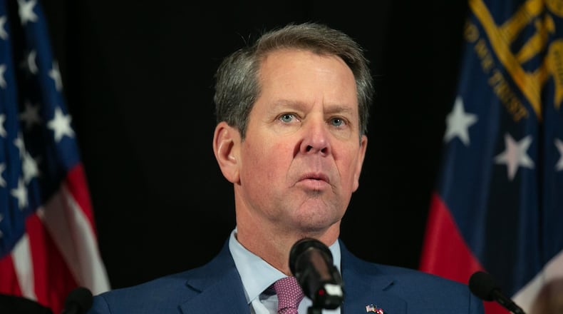 Gov. Brian Kemp, shown before a high school tour on Thursday, Feb. 13, 2020, wants to know why Georgia Military College officials think they don’t have enough for raises for workers. REBECCA WRIGHT / FOR THE AJC