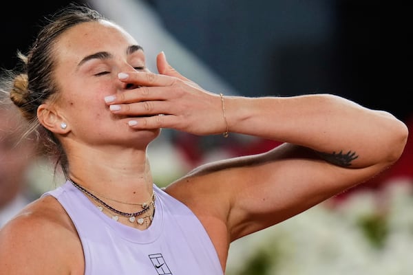 Aryna Sabalenka of Belarus, blows a kiss after defeating United States' Peyton Stearns during the Madrid Open tennis tournament in Madrid, Spain, Tuesday, April 29, 2025. (AP Photo/Manu Fernandez)
