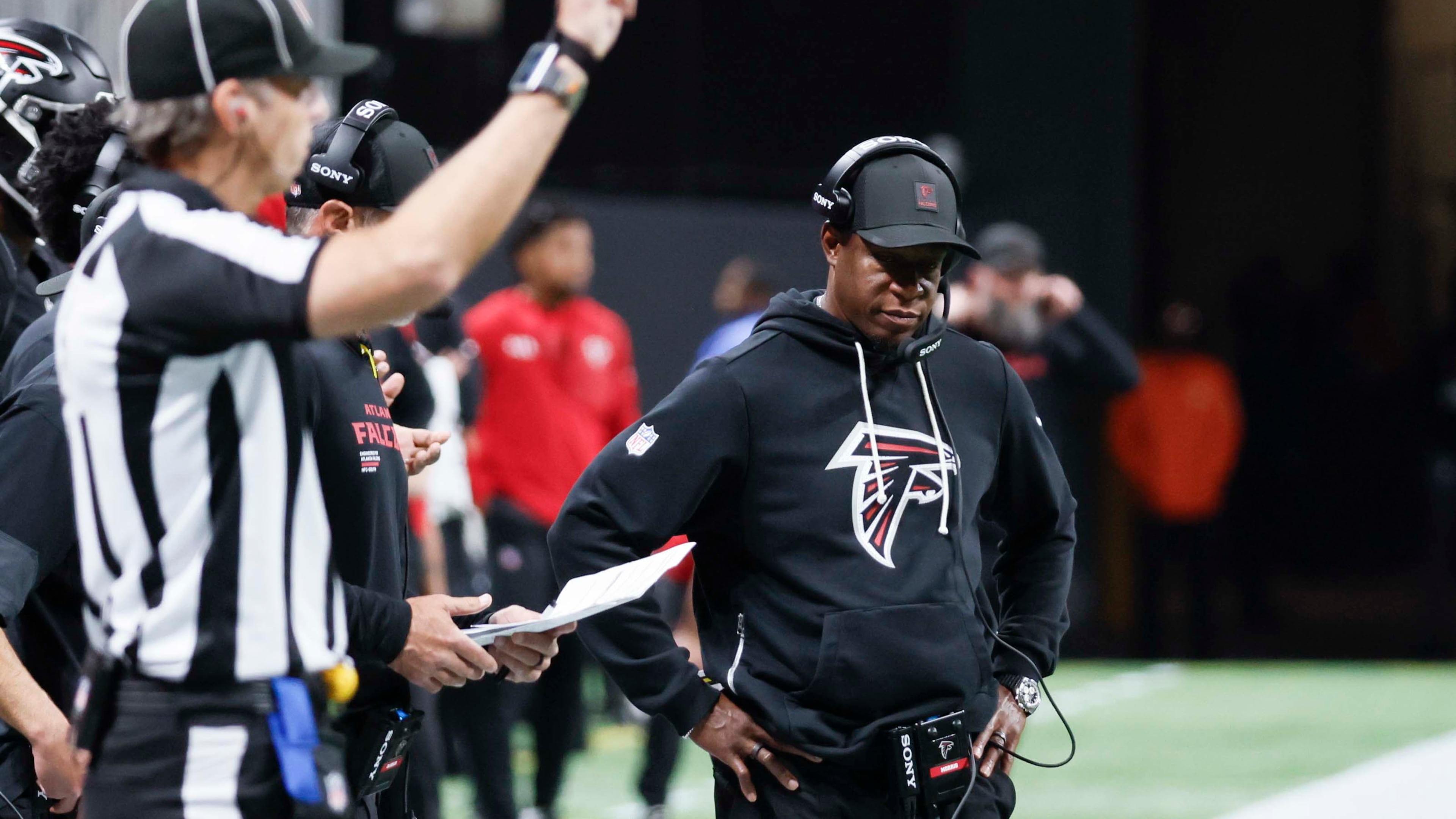 Atlanta Falcons head coach Raheem Morris isn't worried about his team regrouping after a 34-10 loss to Miami, but there's a lot to be concerned about with the rest of the season looming. (Miguel Martinez/AJC)
