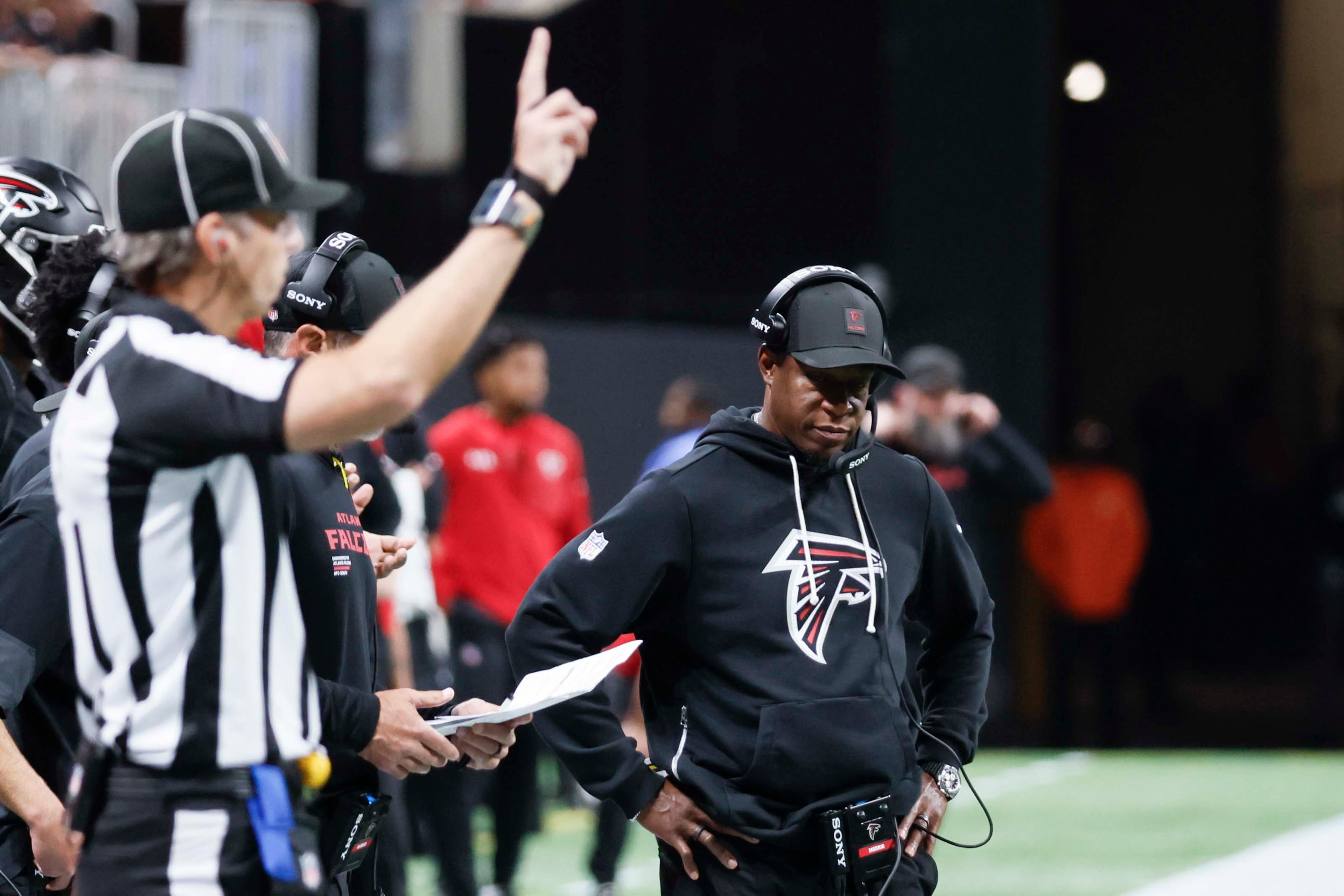 Atlanta Falcons head coach Raheem Morris looks down after a Miami Dolphins touchdown during the second half of an NFL game against the Miami Dolphins at Mercedes-Benz Stadium in Atlanta on Sunday, Oct. 26, 2025. (Miguel Martinez/AJC)