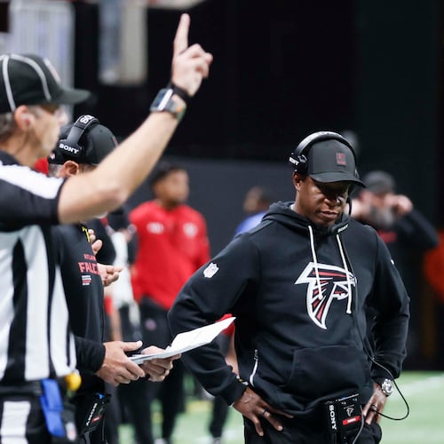 Atlanta Falcons head coach Raheem Morris isn't worried about his team regrouping after a 34-10 loss to Miami, but there's a lot to be concerned about with the rest of the season looming. (Miguel Martinez/AJC)