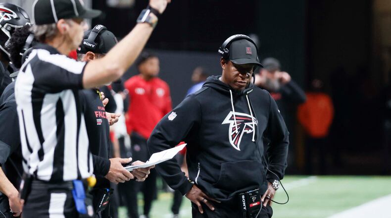 Atlanta Falcons head coach Raheem Morris isn't worried about his team regrouping after a 34-10 loss to Miami, but there's a lot to be concerned about with the rest of the season looming. (Miguel Martinez/AJC)
