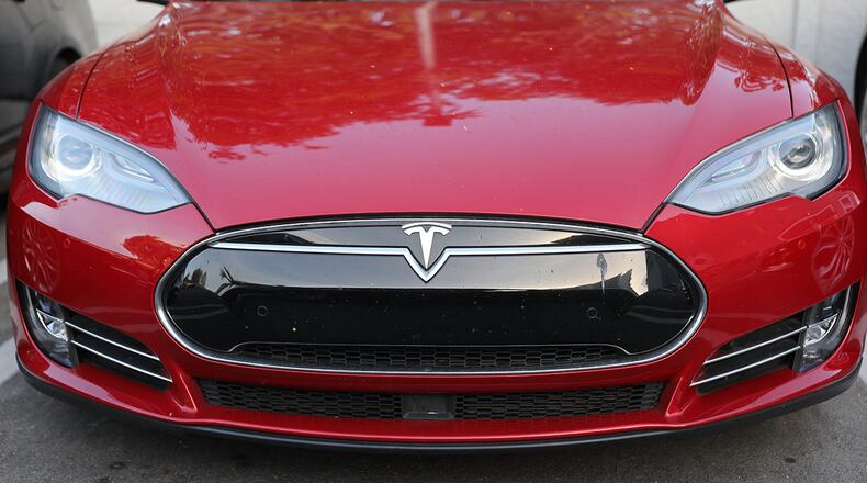 A Tesla spokesperson declined to comment on the video. All new Tesla vehicles currently have autopilot technology. The company considers it a driver assistance system, and it still requires an attentive driver. (Photo by Joe Raedle/Getty Images)