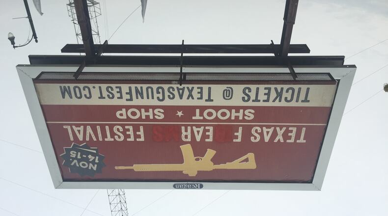 A billboard for the Texas Firearm Festival was vandalized in East Austin.
