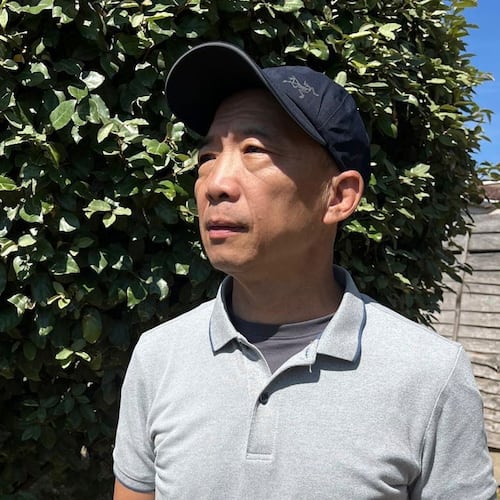 This photo released by Hong Kong's former pro-democracy lawmaker Wu Chi-wai show's himself posing for a portrait in London, Saturday, July 25, 2026. (Wu Chi-wai via AP)