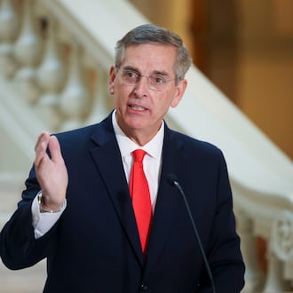 Secretary of State Brad Raffensperger is the latest Georgia politician to challenge the state's campaign finance laws. He says the laws give rival Lt. Gov. Burt Jones an illegal advantage as they campaign for the Republican nomination for governor. (Jason Getz/AJC).