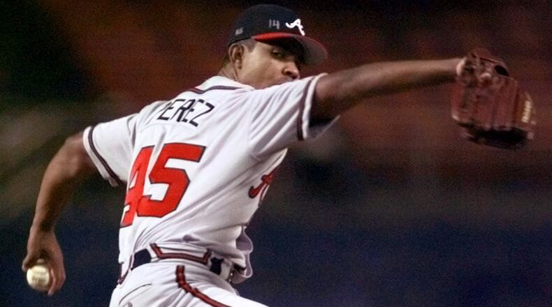 Atlanta Braves starting pitcher Odalis Perez throws against the Los Angeles Dodgers during the first inning Wednesday, April 21, 1999, in Los Angeles. (AP Photo/Kevork Djansezian)