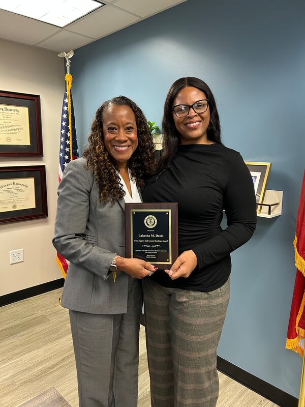 Lakesha Davis (right) worked in Dekalb County DA Sherry Boston's office. Davis was critically injured after being struck by a bullet that entered her Lithonia home over the holiday weekend. (Claire Chaffins)