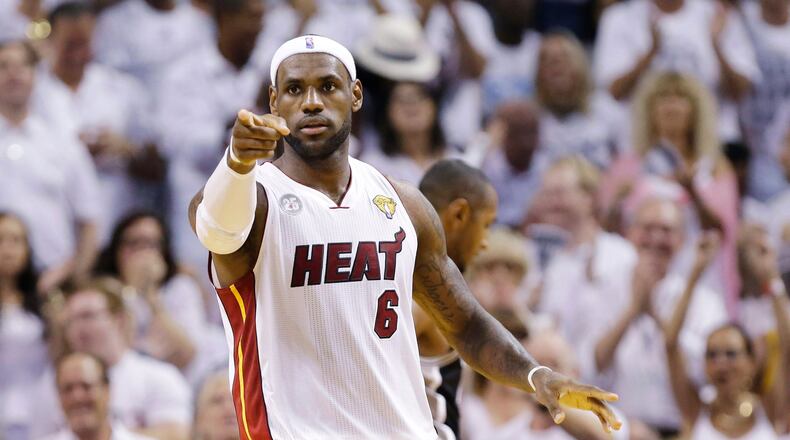 FILE - Miami Heat's LeBron James (6) gestures after a play against the San Antonio Spurs during the first half in Game 7 of the NBA basketball championships, June 20, 2013, in Miami. (AP Photo/Lynne Sladky, File)