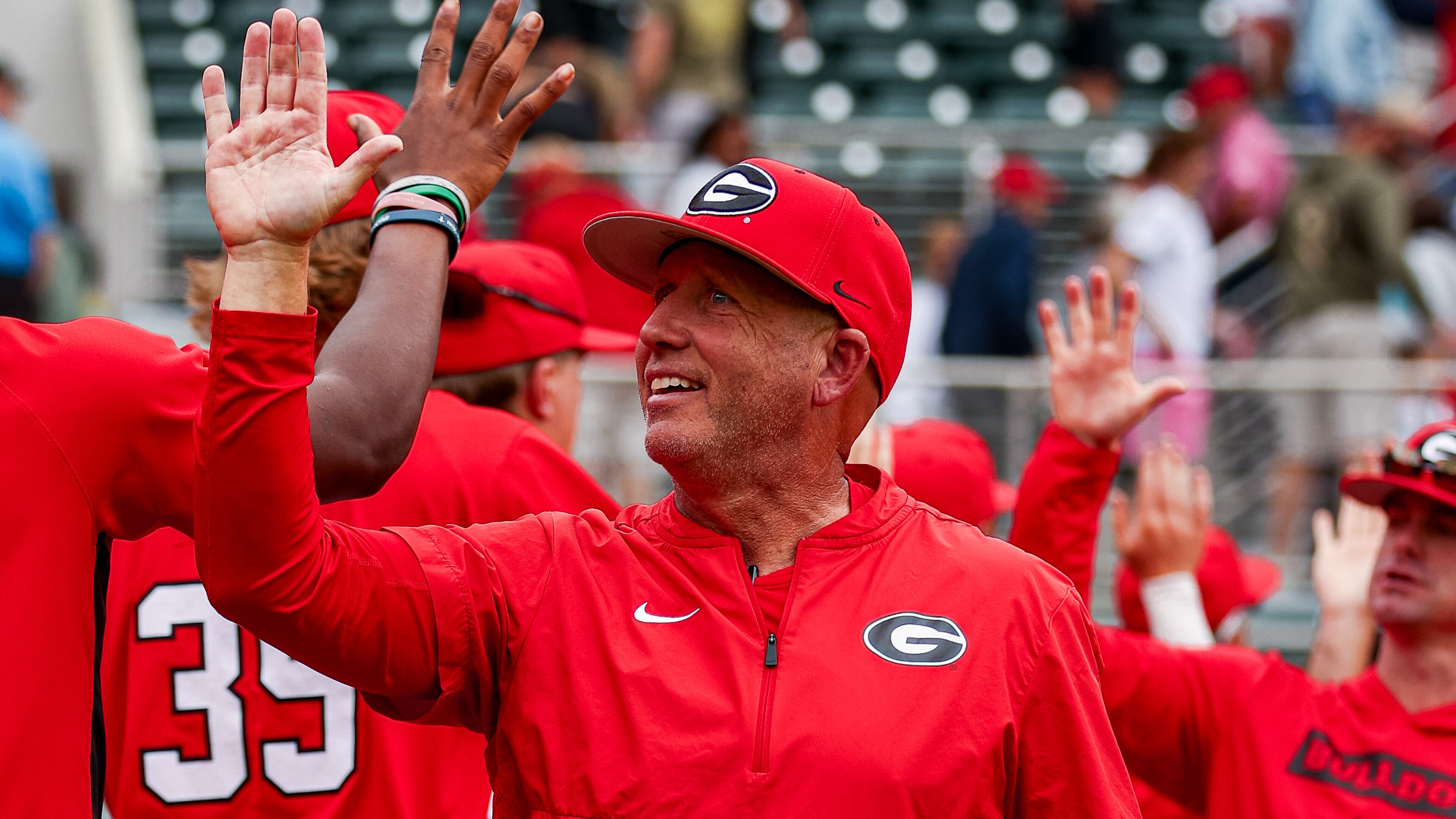 Ike Cousins Head Baseball Coach Wes Johnson after Georgia’s game against Auburn at Foley Field in Athens, Ga., on Saturday, March 29, 2025. (Conor Dillon/UGAAA)