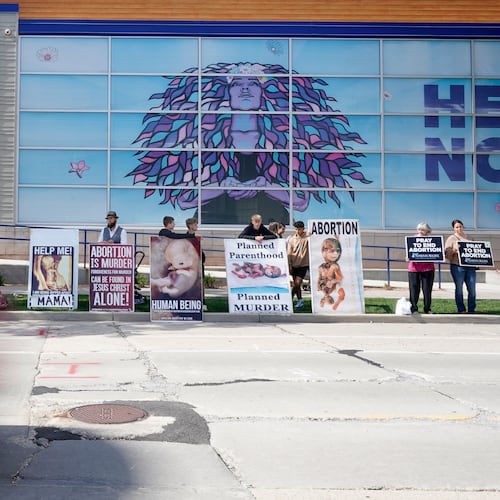 FILE - Protesters are seen outside Planned Parenthood, Sept. 18, 2023, in Milwaukee. (AP Photo/Morry Gash, File)