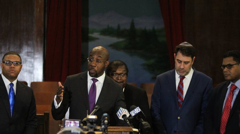 The Rev. Raphael G. Warnock, senior pastor at Ebenezer Baptist Church in Atlanta, addresses the public, along with other Atlanta clergy, to condemn the “vile and racist” remarks made by President Donald Trump at the historic pulpit in Ebenezer Baptist Church in Atlanta, Georgia on Friday, January 12, 2018. (REANN HUBER/REANN.HUBER@AJC.COM)