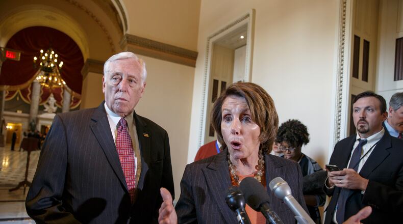 House Minority Leader Nancy Pelosi of Calif., accompanied by House Minority Whip Steny Hoyer of Md., voice their objections to the Republican majority during a delay in voting for a short-term spending bill for the Homeland Security Department that would avert a partial agency shutdown hours before it was to begin, Friday, Feb. 27, 2015, during a news conference on Capitol Hill in Washington. (AP Photo/J. Scott Applewhite) House Minority Leader Nancy Pelosi of Calif., accompanied by House Minority Whip Steny Hoyer of Md., voice their objections to the Republican majority during a delay in voting for a short-term spending bill for the Department of Homeland Security (AP/J. Scott Applewhite)