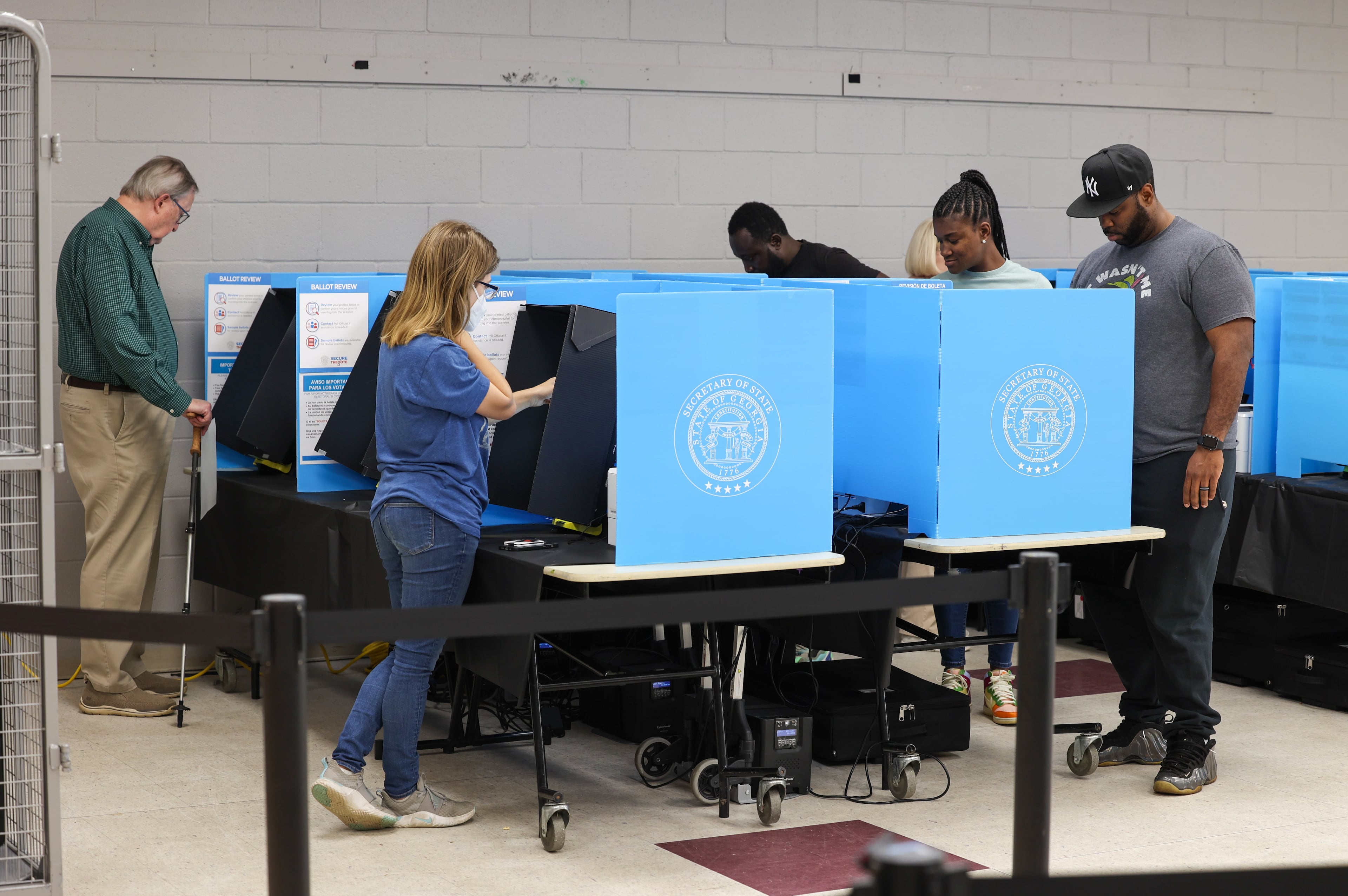 Voters cast their ballots at The Nett Church at Berkmar Church in Lilburn. PHIL SKINNER FOR THE ATLANTA JOURNAL-CONSTITUTION