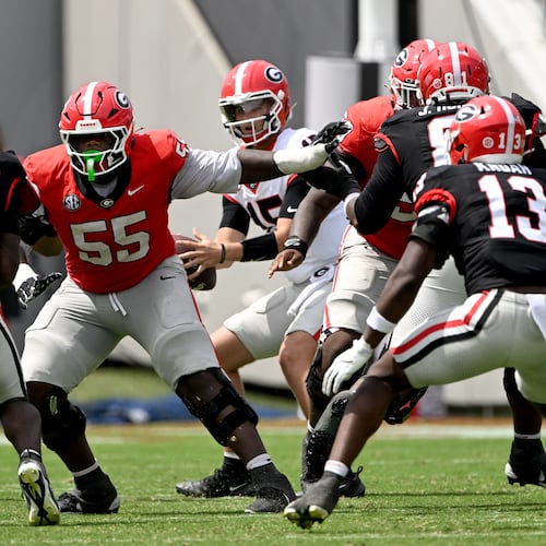 Georgia offensive lineman Zykie Helton blocks as quarterback Ryan Montgomery prepares to make a pass during G-Day on April 18, 2026. (Hyosub Shin/AJC)