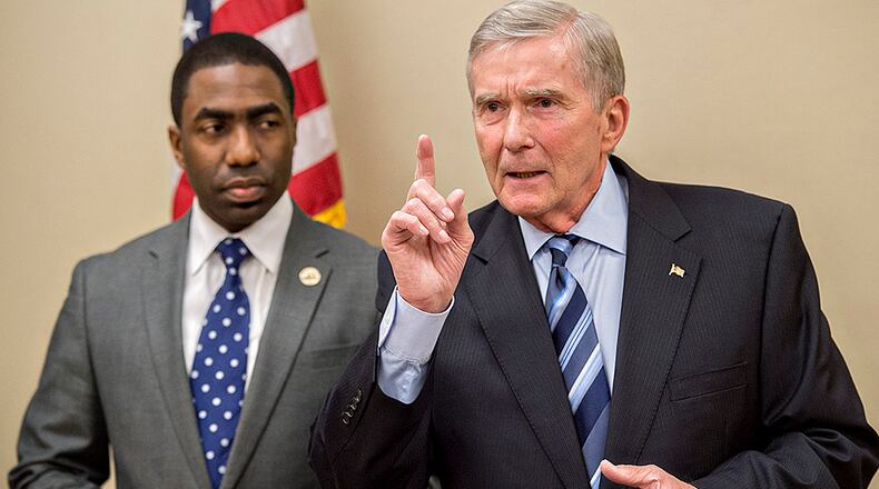 Former state Attorney General Mike Bowers (right) led the investigation for DeKalb interim CEO Lee May.