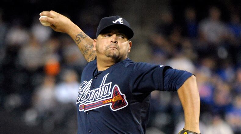 Atlanta Braves pitcher Williams Perez delivers the ball to the New York Mets during the first inning of a baseball game Wednesday, Sept. 23, 2015, in New York. (AP Photo/Bill Kostroun)