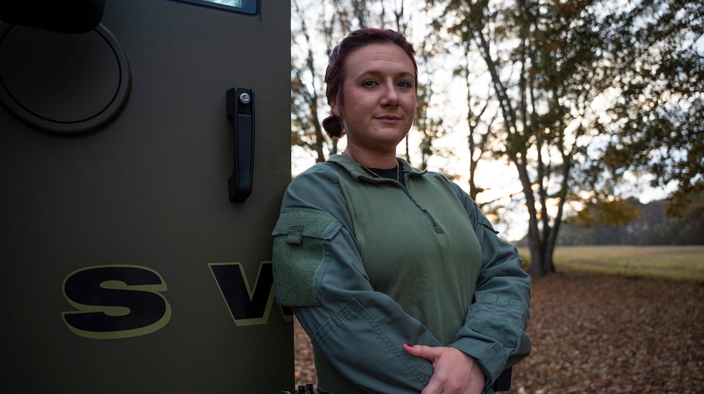 Deputy Kirstie Gentry is the first woman to serve on the Carroll County Sheriff's Office's SWAT team. She also works as their medic. (Olivia Bowdoin for the AJC)