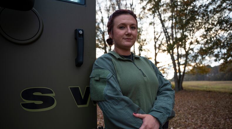 Deputy Kirstie Gentry is the first woman to serve on the Carroll County Sheriff's Office's SWAT team. She also works as their medic. (Olivia Bowdoin for the AJC)