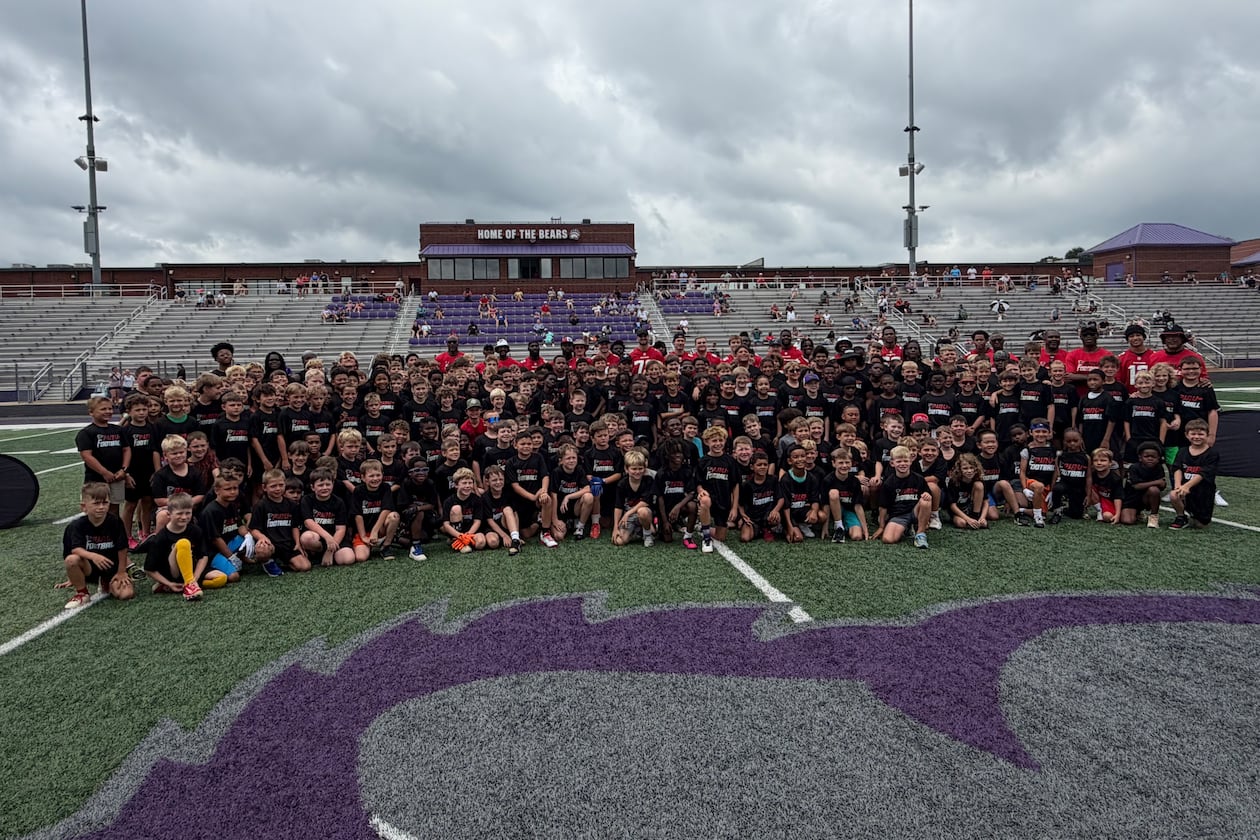 Falcons rookies take a photograph with youth camp participants at Cherokee Bluff High School in Flowery Branch on Monday, June 22, 2026. (Daniel Flick/AJC)