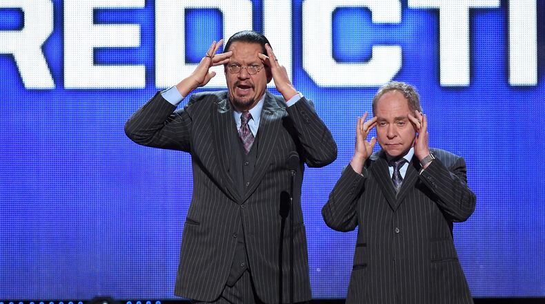 LAS VEGAS, NV - JUNE 22:  Penn Jillette (L) and Teller of the comedy/magic team Penn & Teller perform during the 2016 NHL Awards at The Joint inside the Hard Rock Hotel & Casino on June 22, 2016 in Las Vegas, Nevada.  (Photo by Ethan Miller/Getty Images)