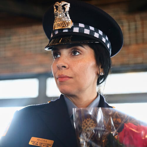 FILE - Police officer Krystal Rivera talks about why she decided to become an officer after a graduation ceremony, Oct. 20, 2021, at Navy Pier in Chicago. (Anthony Vazquez/Chicago Sun-Times via AP, File)