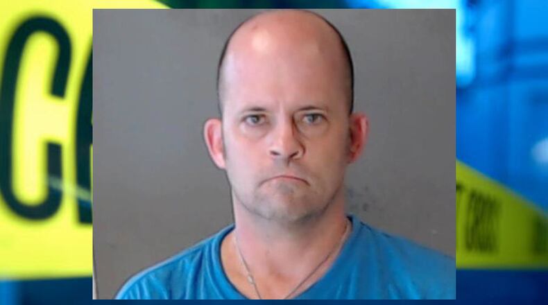 After throwing a dog off an exit ramp in DeKalb County, Michael Copeland was arrested on a felony animal cruelty charge, according to the DeKalb County Police Department.