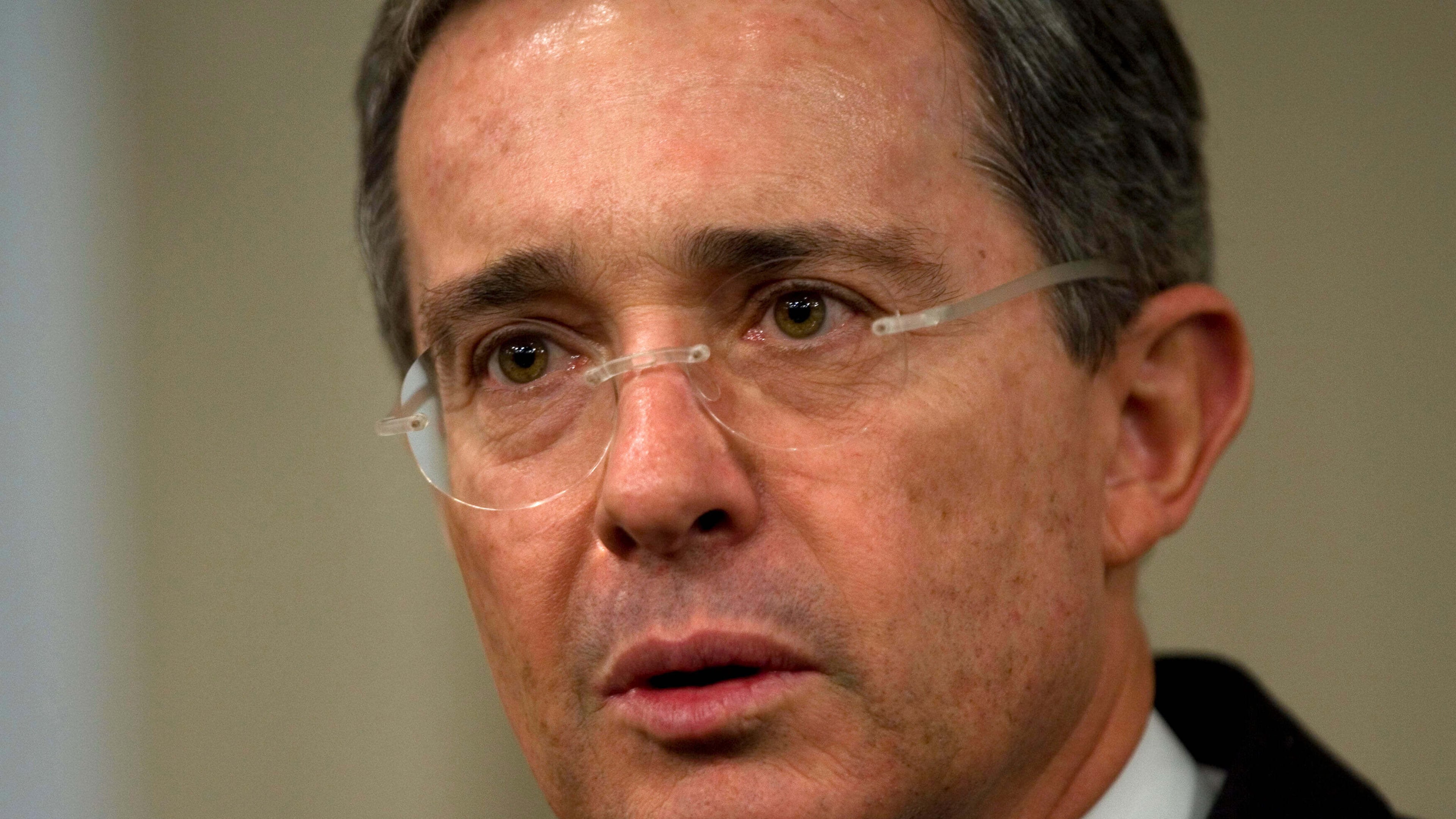 FILE - Alvaro Uribe, President of Colombia, speaks during a news conference in Lima, Peru, May 15, 2008. (AP Photo/Dario Lopez-Mills, File)