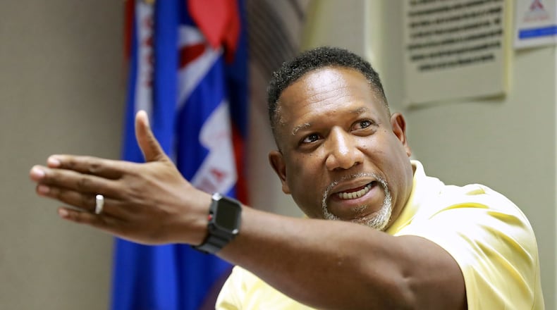 Airport director Mario Evans answers questions from local residents on plans to expand and build 8 new hangers close to Clairmont Road during Monday’s airport advisory board meeting at DeKalb-Peachtree Airport on Monday, June 10, 2019, in Atlanta. Curtis Compton/ccompton@ajc.com