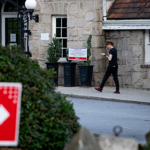 A woman walks into the Park Tavern voting precinct to vote in the Georgia Public Service Commission runoff election on Tuesday, July 15, 2025. (Ben Hendren for the AJC)