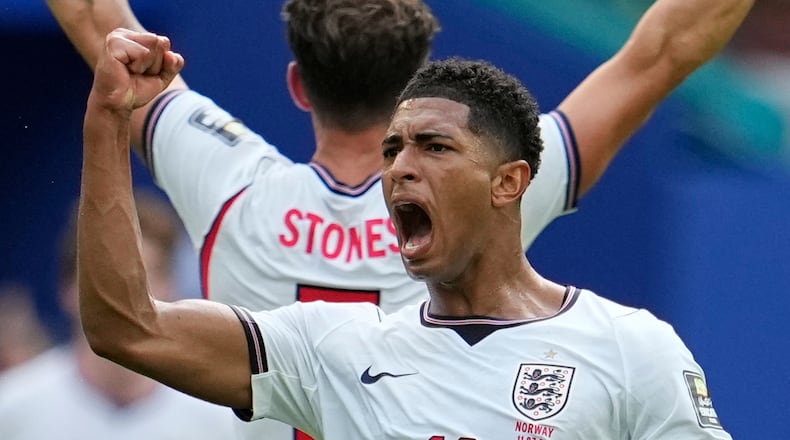 England's Jude Bellingham (10) celebrates scoring their first goal during the World Cup quarterfinal soccer match between Norway and England in Miami Gardens, Fla., Saturday, July 11, 2026. (AP Photo/George Walker IV)