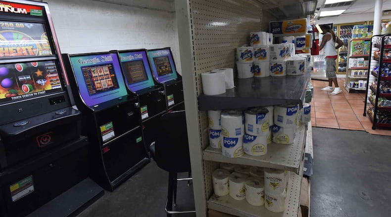A convenience store in the Pittsburgh neighborhood has four coin-operated amusement machines in the back of the store. Lilburn recently passed changes to the city's zoning ordinance restricting these machines. HYOSUB SHIN / HSHIN@AJC.COM